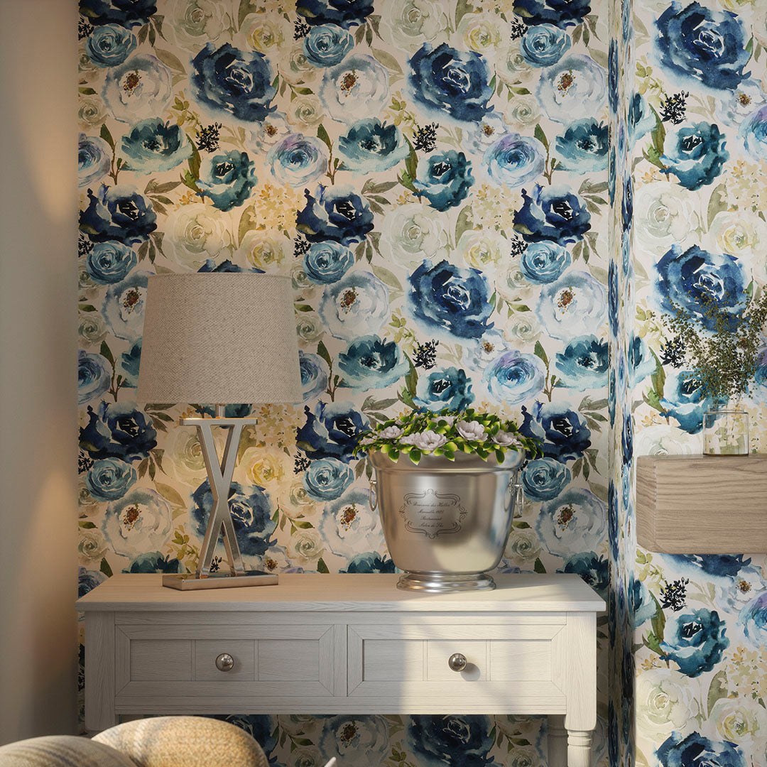 Living room nook featuring watercolour-style floral wallpaper in blues and creams. 