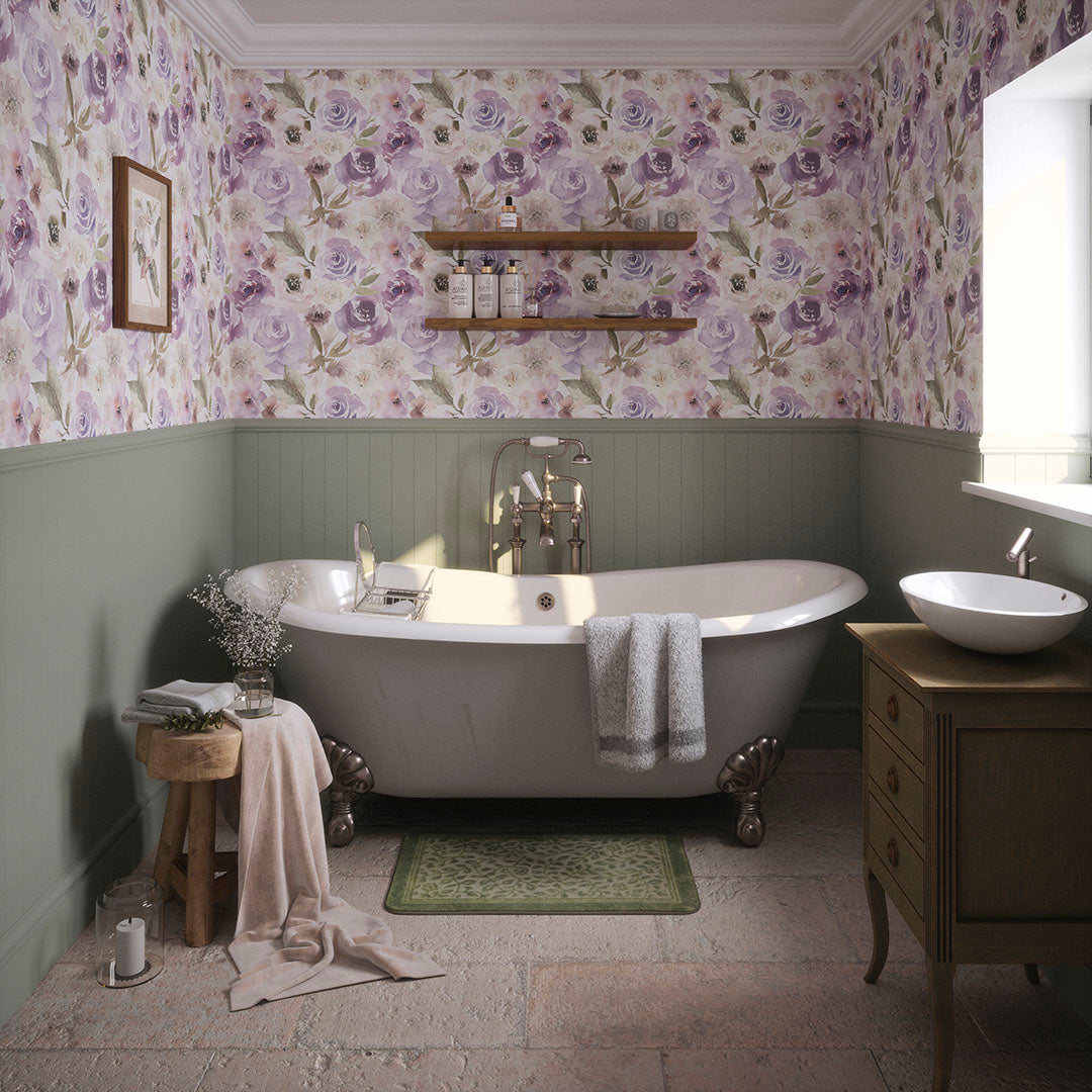 Cottage bathroom setting with green panelled walls featuring watercolour florals in lavender.