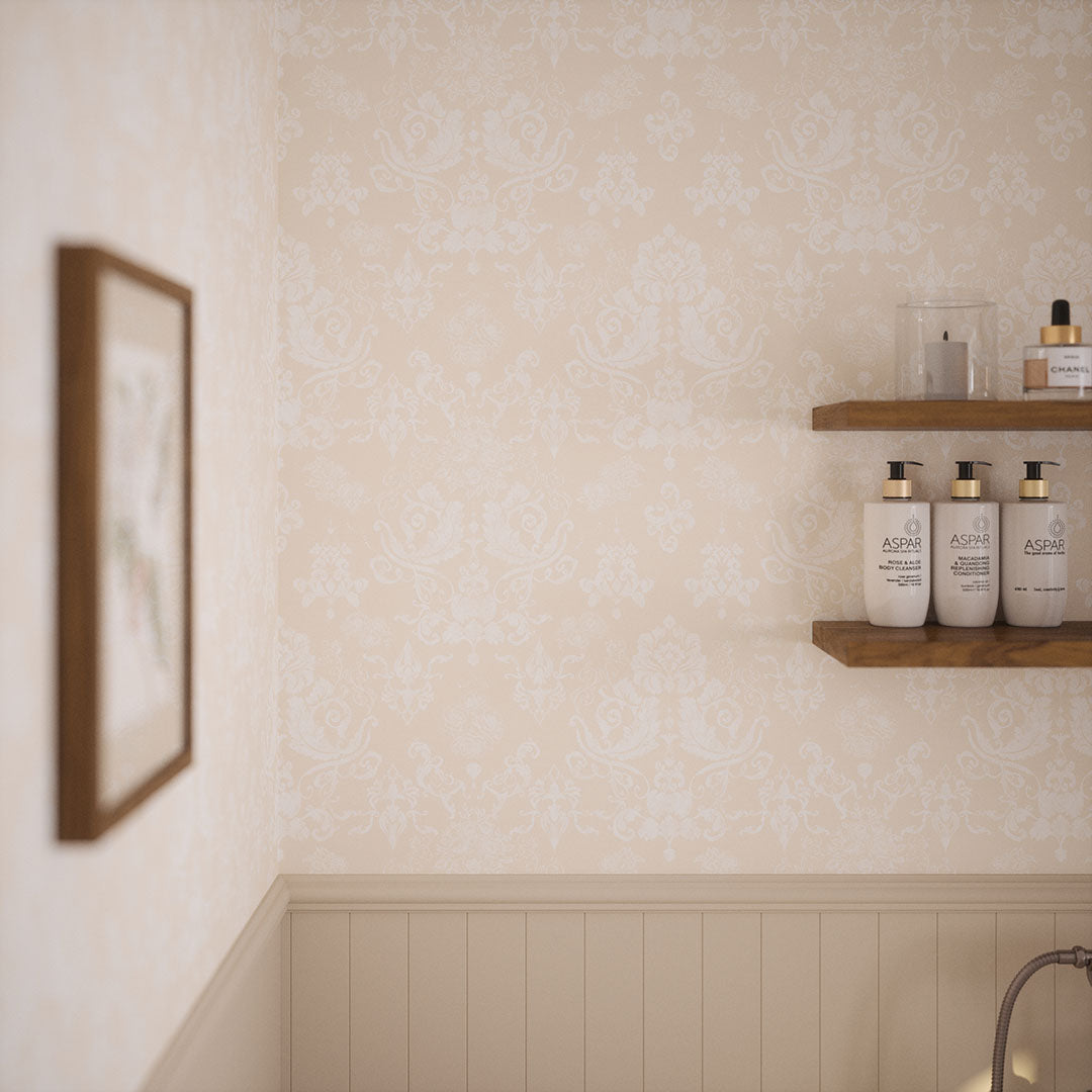 Bathroom wall with wooden shelves and damask wallpaper featuring cream floral motifs.