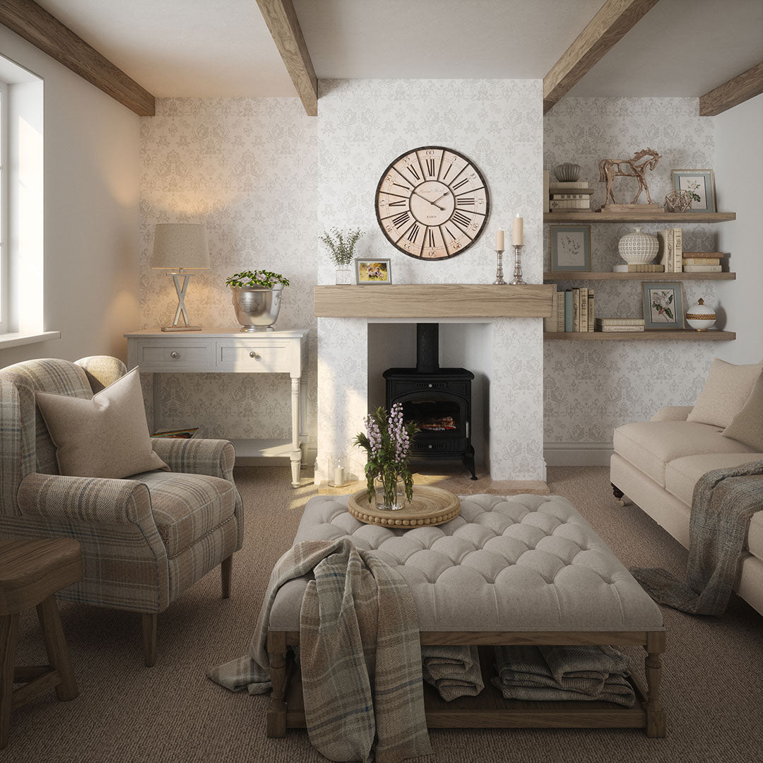 Cottage living room setting with soft furnishings and fabrics with grey damask wallpaper. 