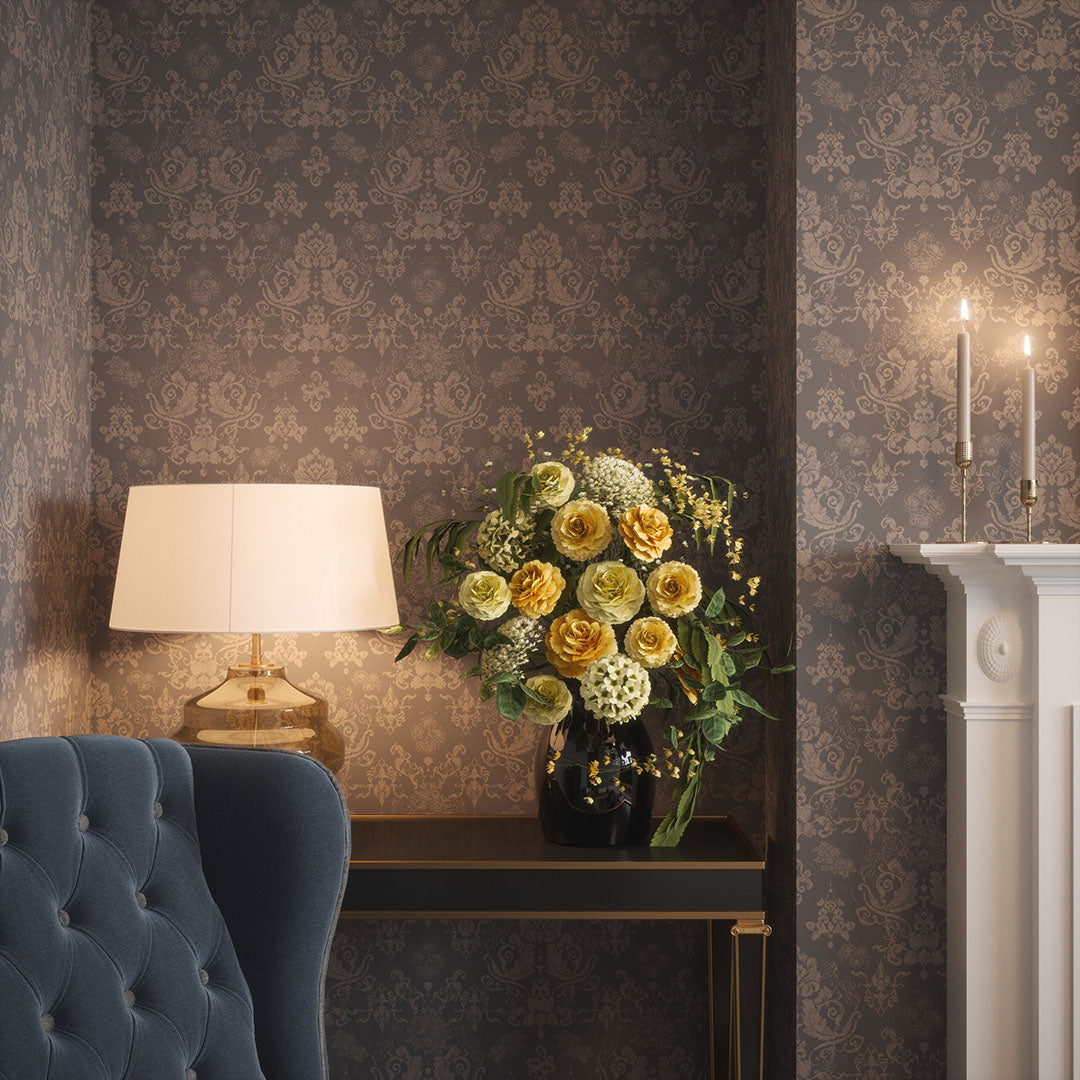 Living room nook featuring damask wallpaper in slate grey and light grey floral motifs. 