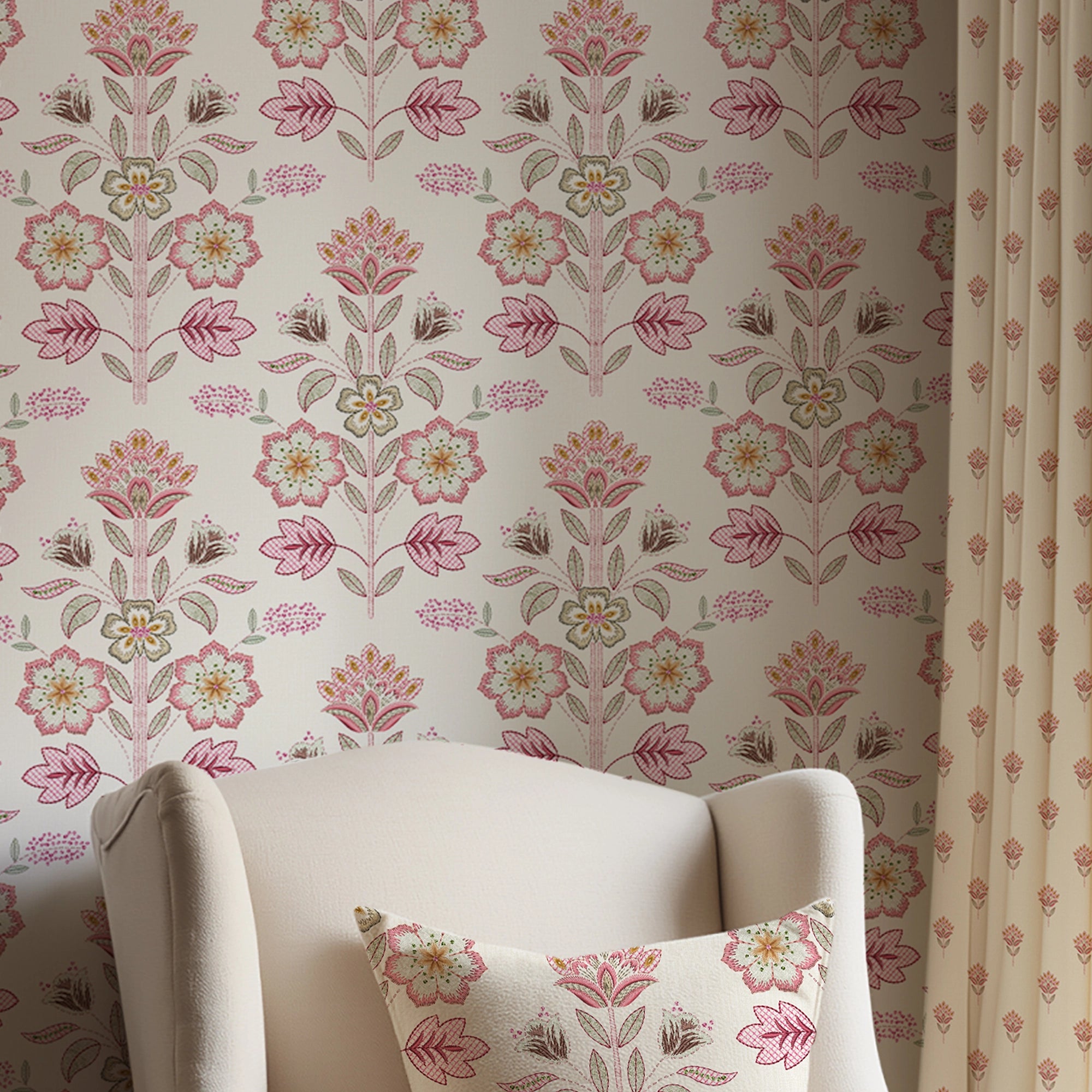 Floral-patterned wallpaper with a chair and matching pillow in the foreground.