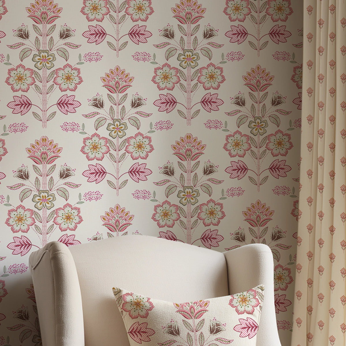 Floral-patterned wallpaper with a chair and matching pillow in the foreground.