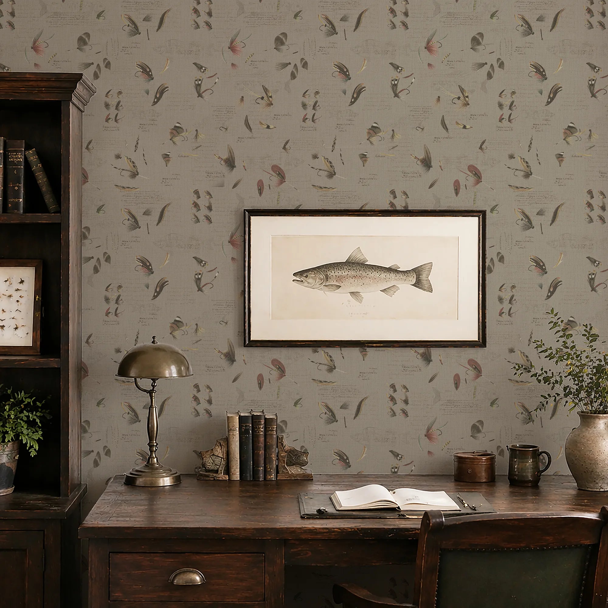 Traditional office setting with framed fish artwork on a patterned wall.