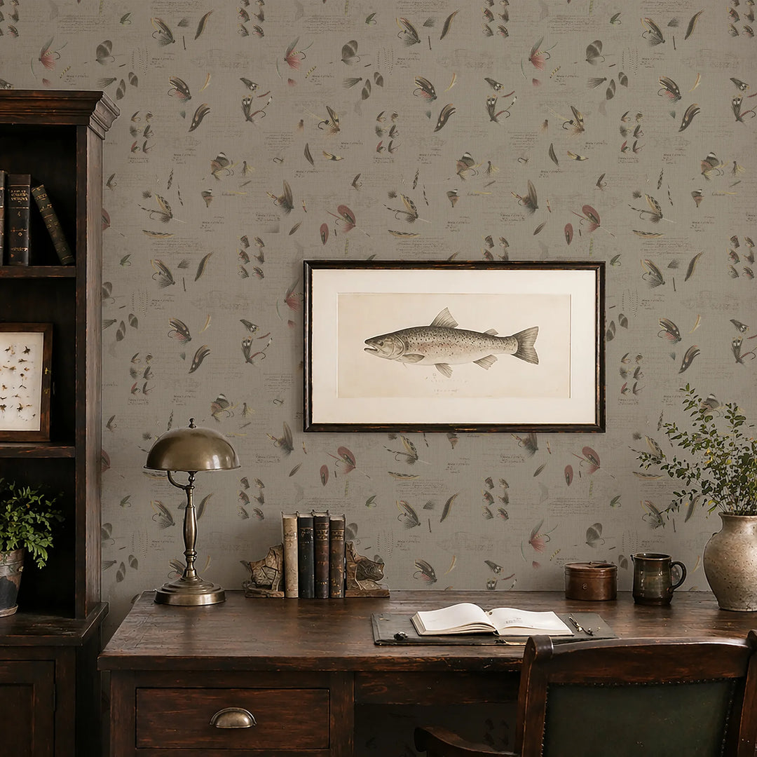 Traditional office setting with framed fish artwork on a patterned wall.