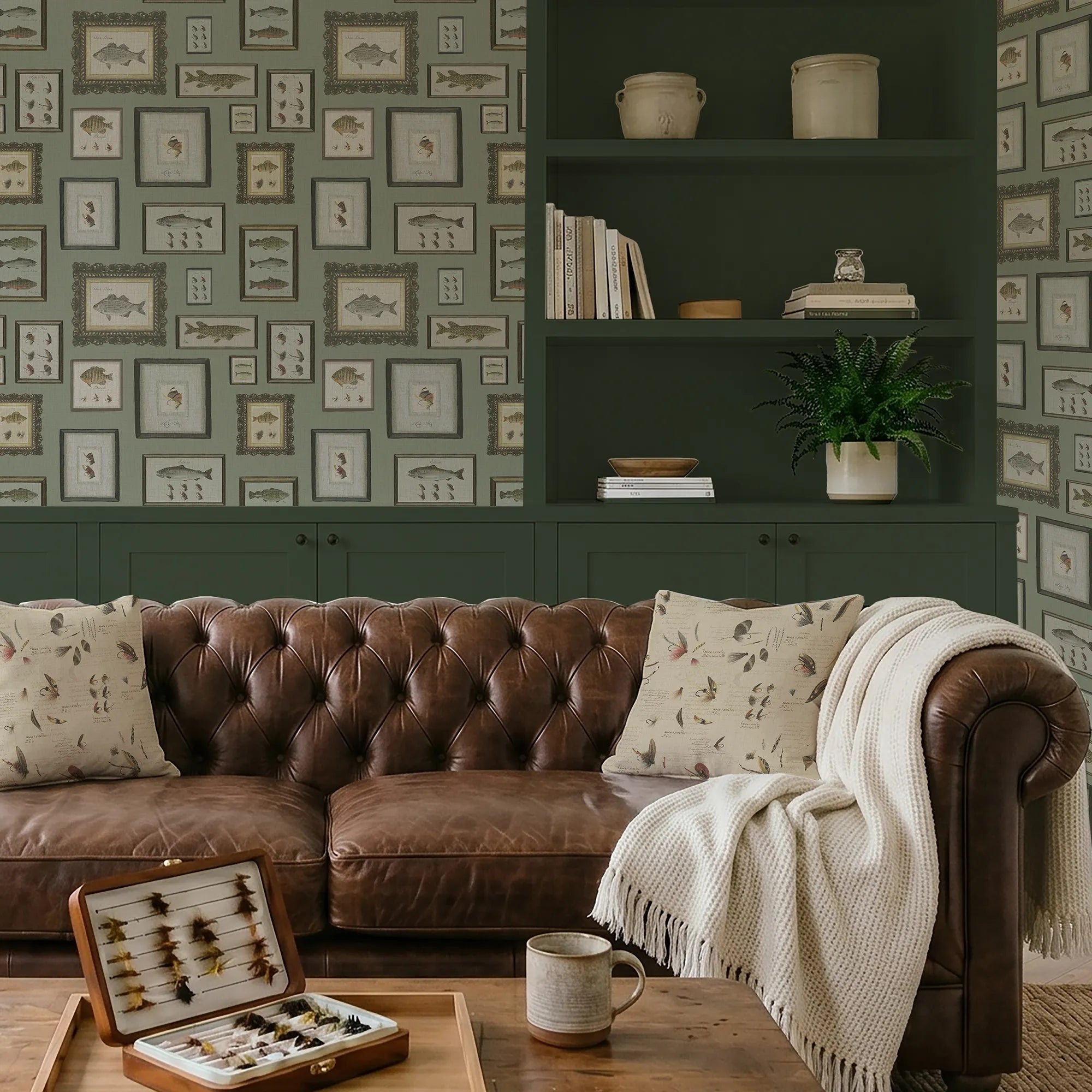 Cozy living room with brown leather sofa, patterned wallpaper, and bookshelf.