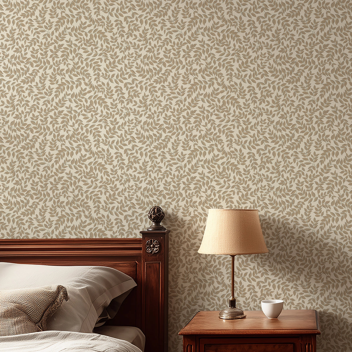 Bedroom with a wooden bed and nightstand against a patterned wall with brown trailing leaves.
