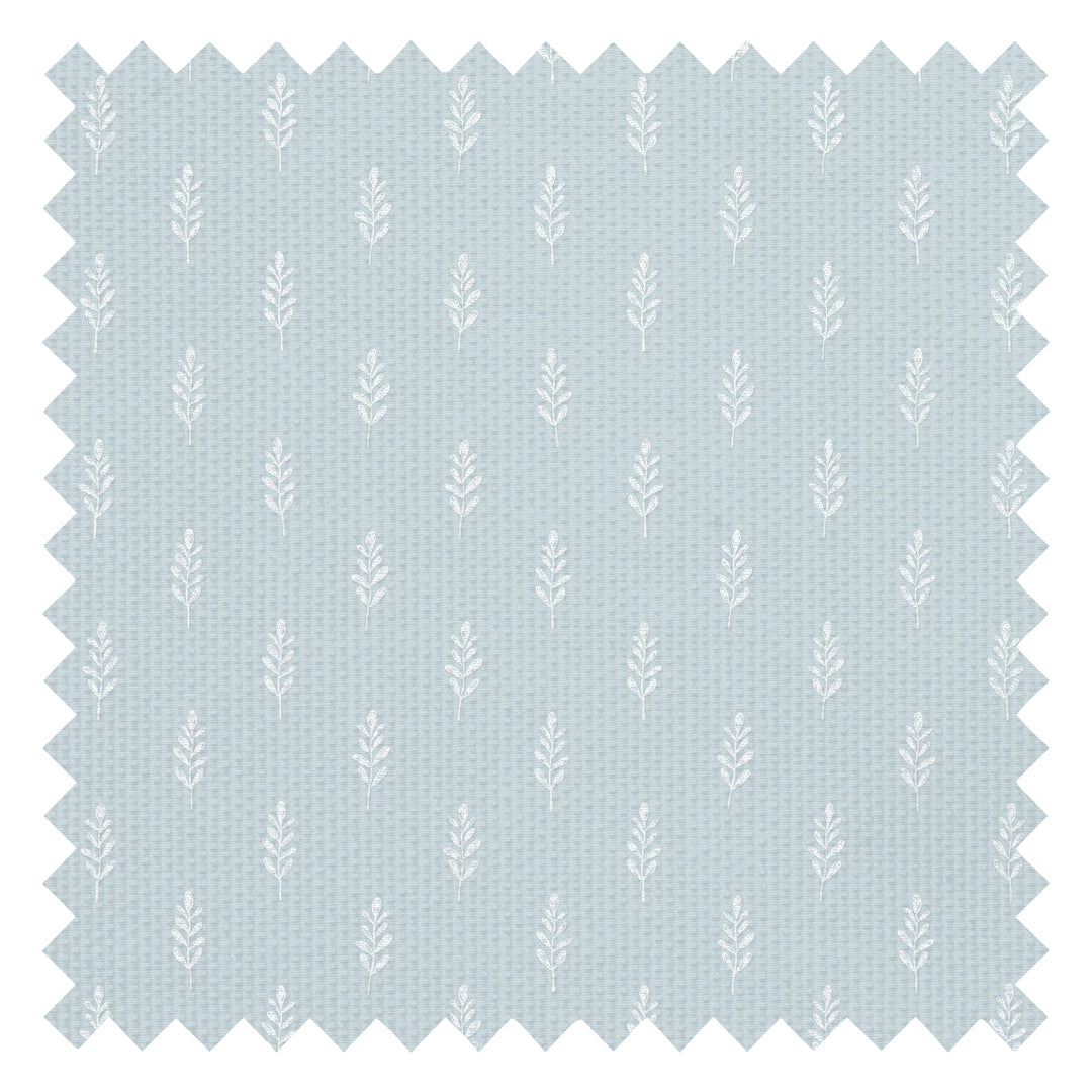 Rowan Fabric in Milk White on Blue